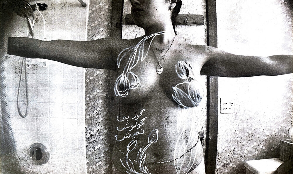 Black and white, grainy image of a figure's torso with their arms outstretched to either side. The figure's chest is obscured by drawings of flowers and Perian/Farsi text.
