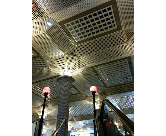 The complex, geometrical pattern of the subway ceiling in 60 Wall street.