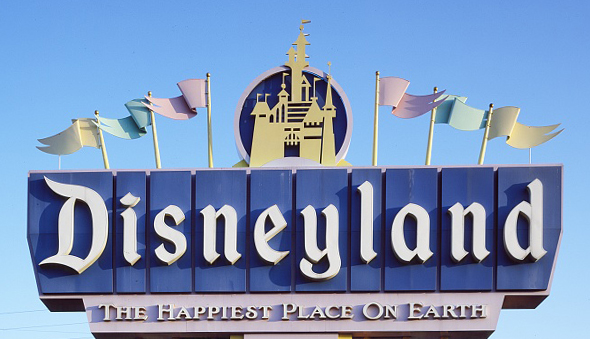The entry sign to Dinsyeland, with the words "the happiest place on earth"