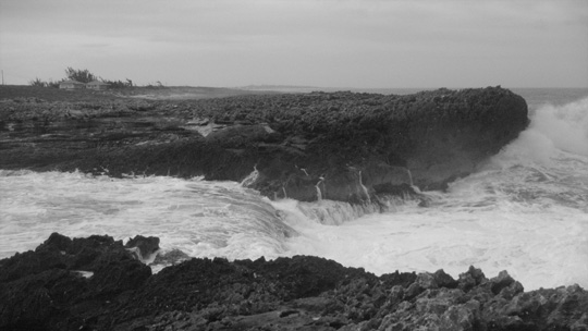Cliff at Whale Point with crashing wave. 