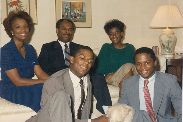 My dad and his family are all dressed up for a family portrait in the early 1990s.