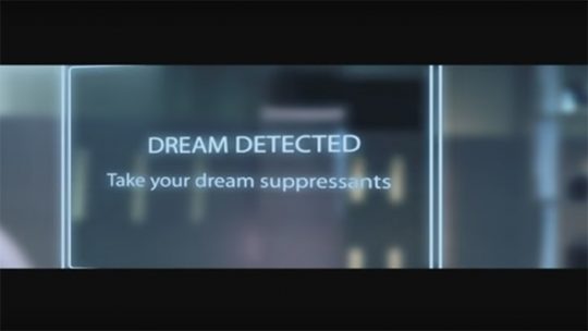 A message on a glass scrim reads "DREAM DETECTED. Take your dream suppressants."