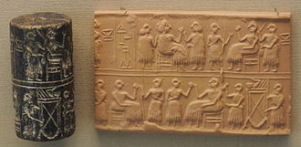 Photograph of a cylinder seal next to its impression: Female figures raise cups and sit at tables