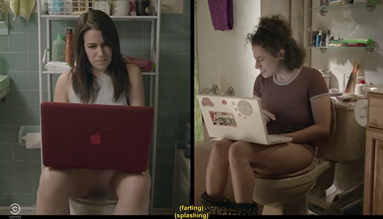 Still from <em>Broad City</em>: a split screen of two women sitting on the toilet on their laptops. 
