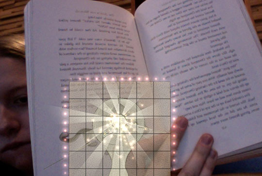 Augmented reality of a book with a cartoon design element. 