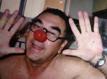 The author's father with a red clown nose, posing for the camera.
