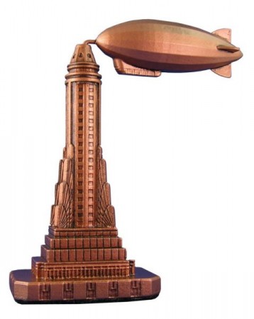 Copper model of the Empire State Building with a blimp.